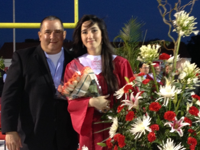 John & Allison Shaker at Allisons high school graduation - 1 year early! 2014