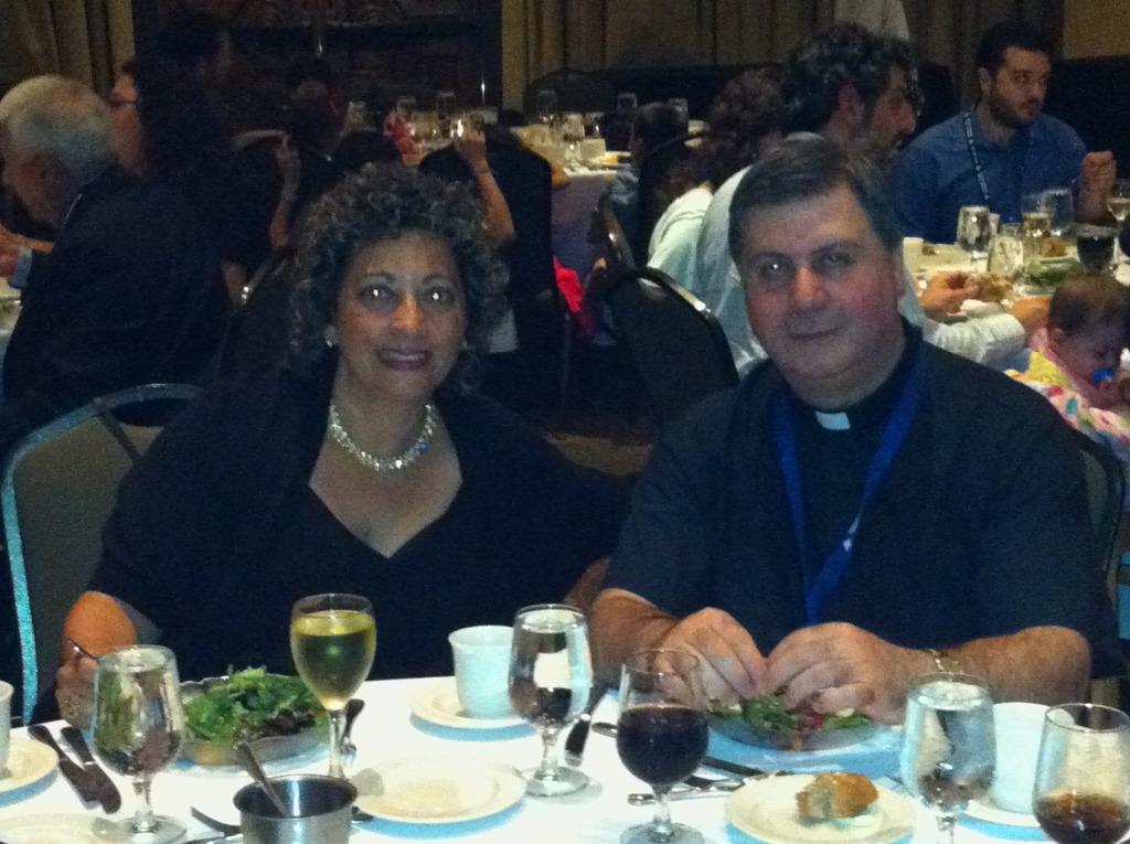 Cathy Shaker Breit with Father Alfred